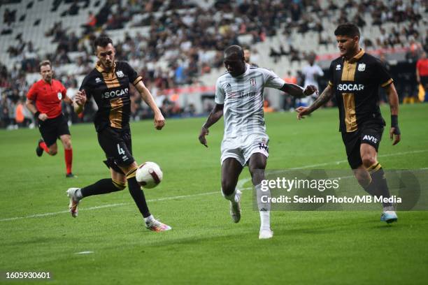 Vincent Aboubakar of Besiktas and Mark Tamas , Yuri Matias of Neftci Baku PFK battle for the ball during the UEFA Europa Conference League third...