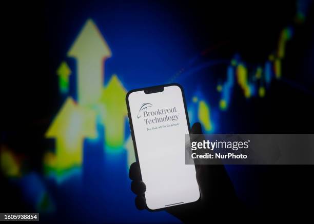 The Brooktrout Technology logo is seen on a mobile device in this illustration photo in Warsaw, Poland on 17 August, 2023.