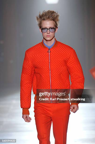 Model walks the runway at the John Lawrence Sullivan Autumn Winter 2013 fashion show during Paris Menswear Fashion Week on January 16, 2013 in Paris,...