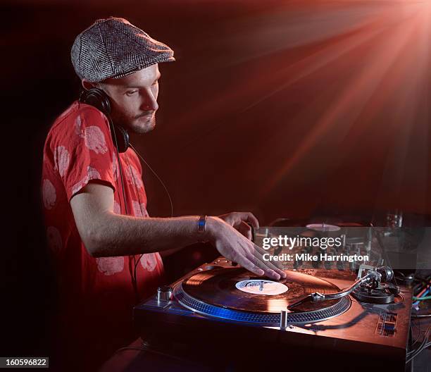 male dj mixing music - dj club stock pictures, royalty-free photos & images