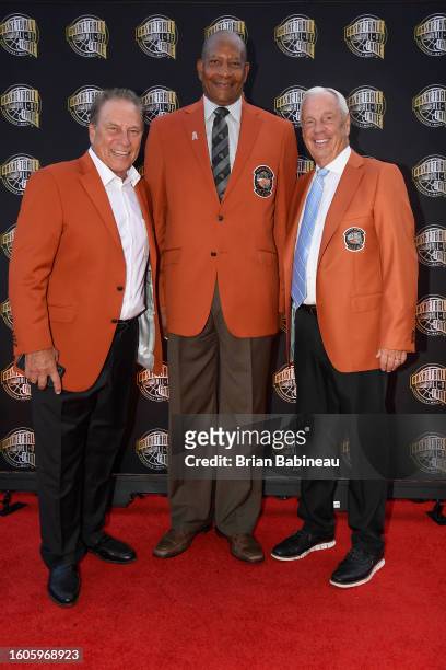 Tom Izzo, Alex English, & Roy Williams poses for a photo at the 2023 Basketball Hall of Fame Enshrinement Ceremony on August 12, 2023 at Springfield...