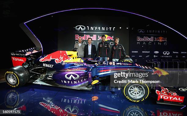 Adrian Newey, Chief Technical Officer, Christian Horner, Team Principle, Mark Webber of Australia and Sebastian Vettel of Germany pose along side the...