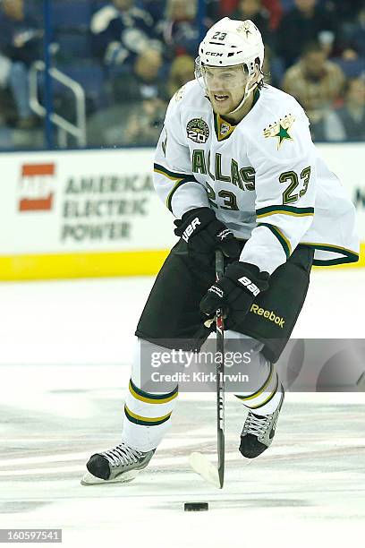 Tom Wandell of the Dallas Stars skates with the puck during the game against the Columbus Blue Jackets on January 28, 2013 at Nationwide Arena in...