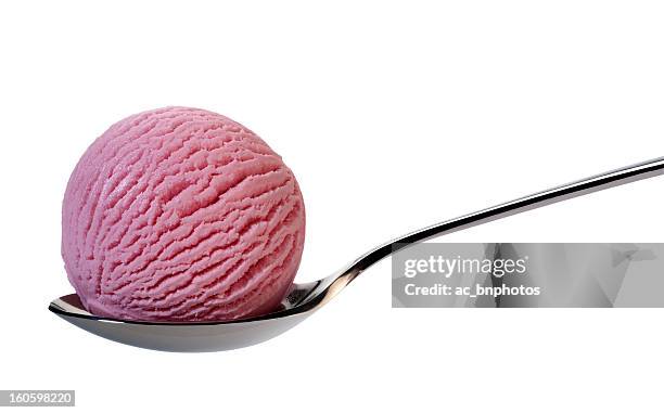 strawberry ice cream on spoon - aardbeienijs stockfoto's en -beelden