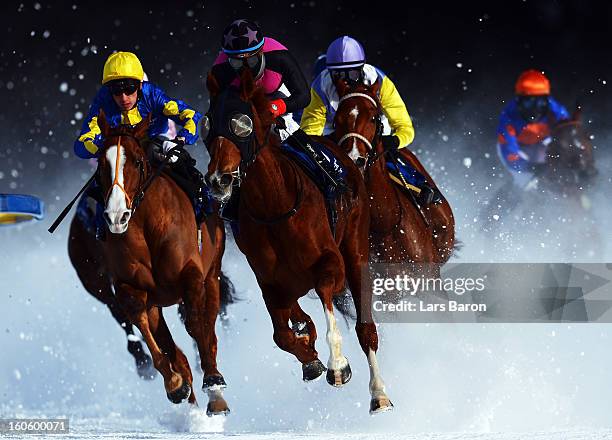 Tepmokea ridden by Shane Kelly and Amazing Beauty ridden by Mirco Demuro lead the field into the final turn during the Grand Prix Guardaval...