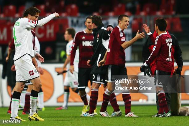 Roel Brouwers of Moenchengladbach reacts as players of Nuernberg celebrate after the Bundesliga match between 1. FC Nuernberg and VfL Borussia...