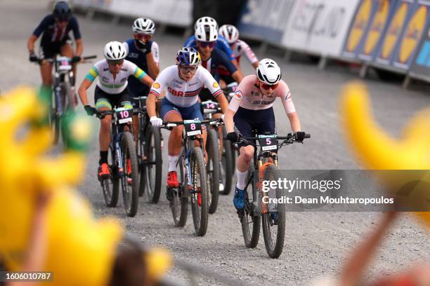 Evie Richards of Great Britain and Puck Pieterse of Netherlands compete during the Women Elite Cross-country Short Track at the 96th UCI Cycling...