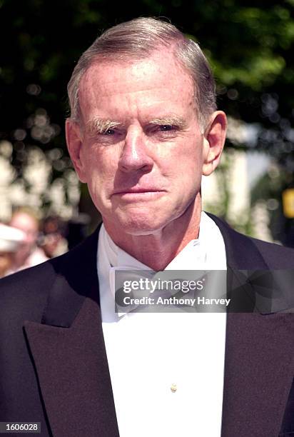American Ambassador William Farish stands in white tie outside the U.S. Embassy August 01, 2001 before his meeting with Queen Elizabeth at Buckingham...