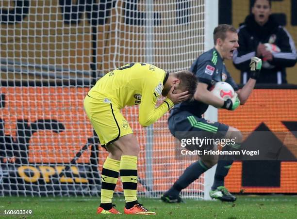 Jakub Kuba Blaszczykowski of Dortmund reacts after missing a penalty against Bernd Leno of Leverkusen during the Bundesliga match between Bayer 04...