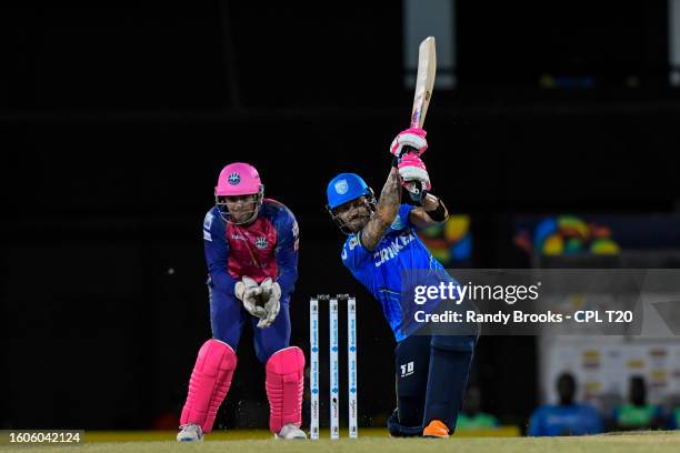 Faf Du Plessis of Saint Lucia Kings hits 4 and Donovan Ferreira of Barbados Royals watch during the Men's 2023 Republic Bank Caribbean Premier League...