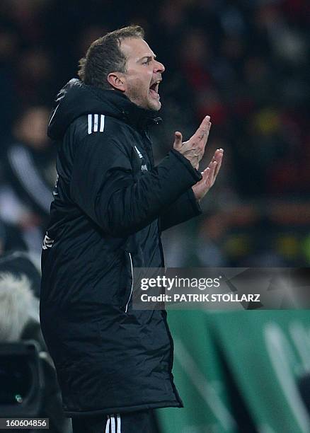 Leverkusen's head coach Sascha Lewandowski reacts during the German first division Bundesliga football match Bayer Leverkusen vs Borussia Dortmund in...