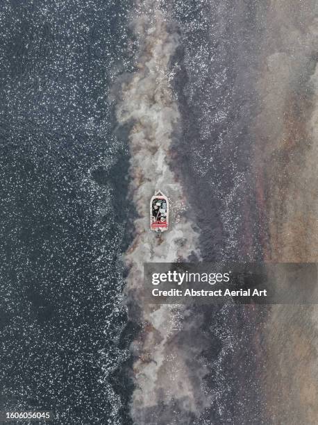 motorboat on the mary river shot from an overhead perspective, northern territory, australia - combine oceania stock pictures, royalty-free photos & images