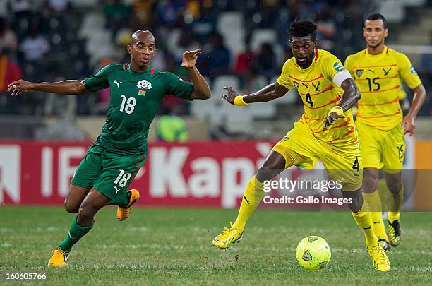 Charles Kabore of Burkina Faso and Emmanuel Adebayor of Togo during the 2013 African Cup of Nations 4th Quarter Final match between Burkina Faso and...