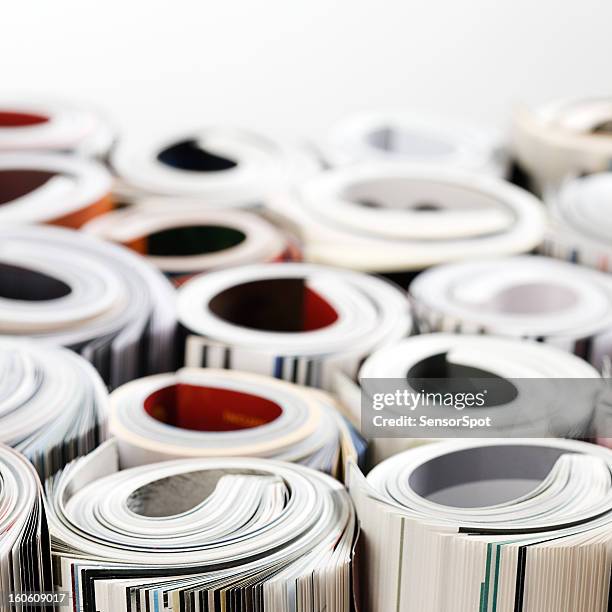 Magazine Roled Rolled Magazine Photos and Premium High Res Pictures - Getty Images