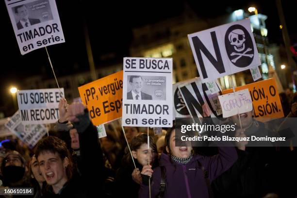 Protestors shout slogans during a demonstration against alleged corruption scandals implicating the PP , on the streets of Madrid on February 3, 2013...