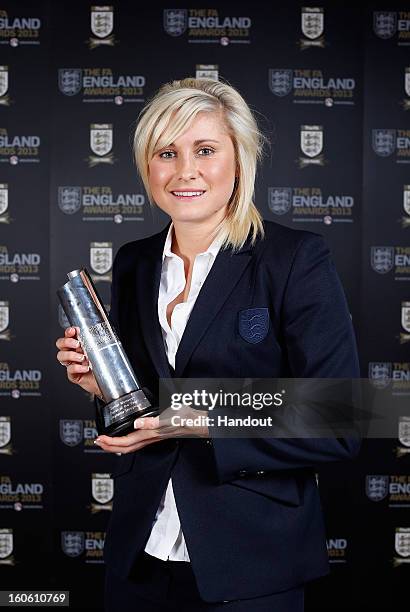 In this handout image provided by The FA, Stephanie Houghton poses with the Senior Women's Player of the Year award during the FA England Awards 2013...