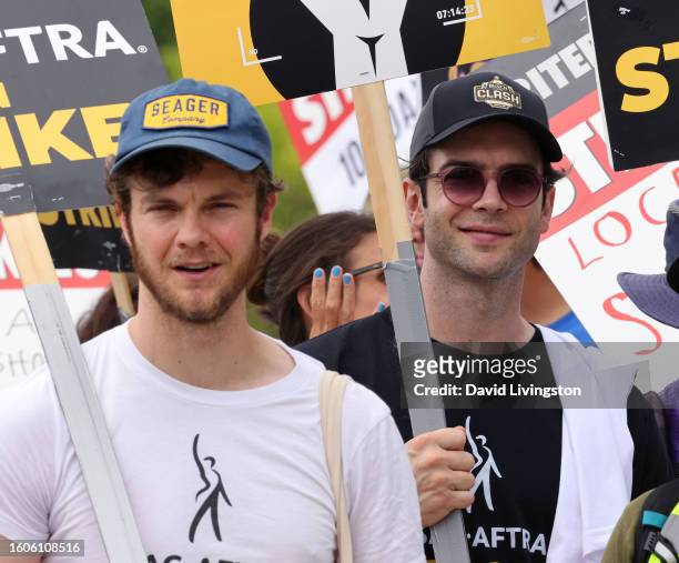 Jack Quaid and Ethan Peck walk the picket line at Paramount Studios on August 10, 2023 in Los Angeles, California. Members of SAG-AFTRA and WGA have...