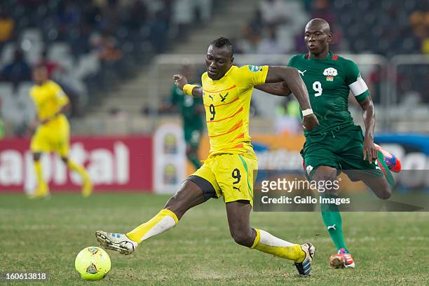 Vincent Bossou from Togo and Moumouni Dagano from Burkina Faso during the 2013 Orange African Cup of Nations 4th Quarter Final match between Burkina...