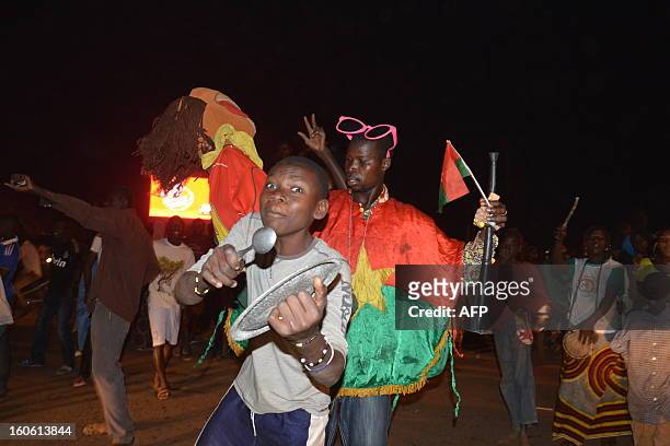 Burkina Faso football supporters cheer during the African Cup of Nation 2013 quarter final football match between Burkina Faso and Togo, in...