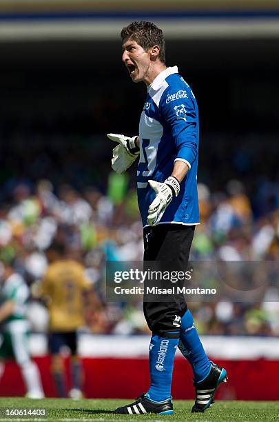 Alejandro Garcia, Pumas goalkeeper talks to his teammates during a match between Pumas and Santos as part of the Clausura 2013 at Olímpico Stadium on...