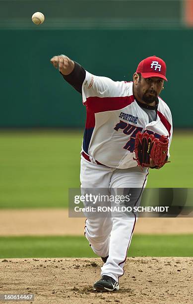 Pitcher Zack Segovia of Criollos de Cagua of Puerto Rico, pitches against Magallanes of Venezuela during the 2013 Caribbean baseball series, on...