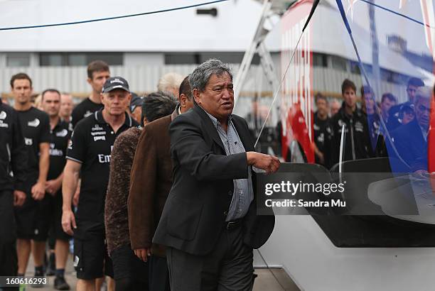 The Team New Zealand crew follow Matt Maihi, Kaumatua of Ngati Whatua Orakei as he blesses the boat during the launch of the Emirates Team New...