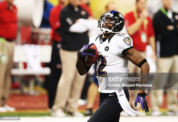 Jacoby Jones of the Baltimore Ravens returns a kick-off 108 yards for a touchdown to open in the second half against the San Francisco 49ers during...