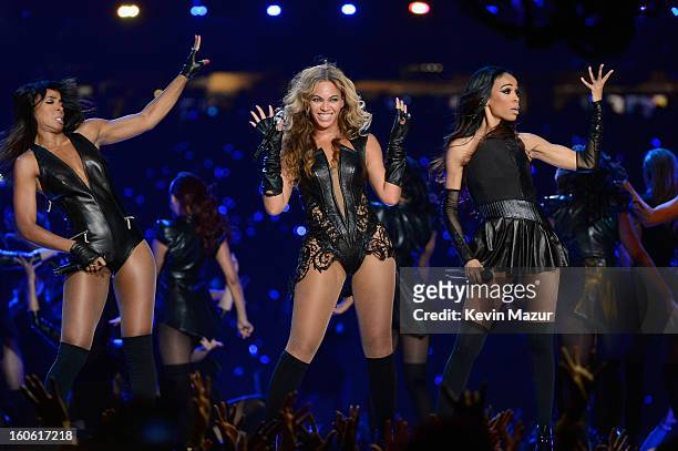 Singers Kelly Rowland, Beyonce and Michelle Williams of Destiny's Child perform during the Pepsi Super Bowl XLVII Halftime Show at Mercedes-Benz...