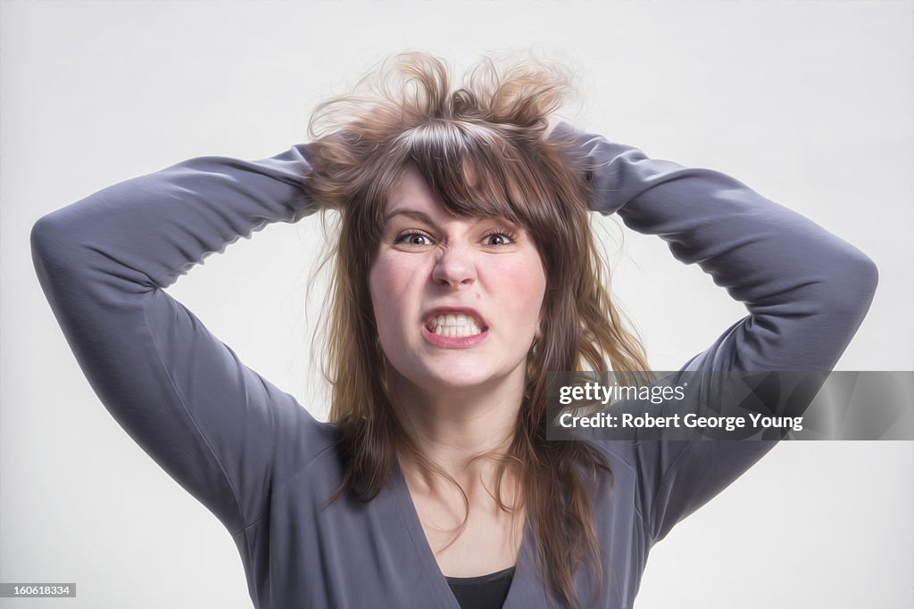 Young woman expressing anger and frustration