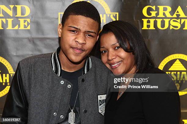 Messiah Harris and Lashon Dixon attend a birthday party for T.I.'s son Messiah at Buckhead Bottlebar on February 2, 2013 in Atlanta, Georgia.