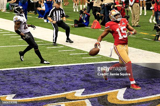 Michael Crabtree of the San Francisco 49ers reacts after running in for a touchdown in the third quarter against the Baltimore Ravens during Super...