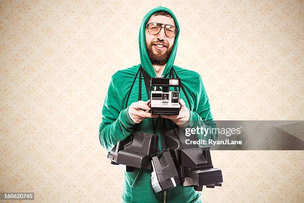 condescending hipster instant print guy - photographer with camera stock pictures, royalty-free photos & images