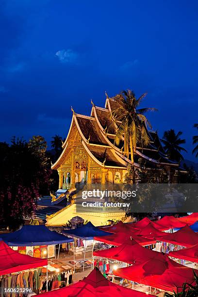 watmai suwannaphumaham in luang prabang, laos - laos stock pictures, royalty-free photos & images