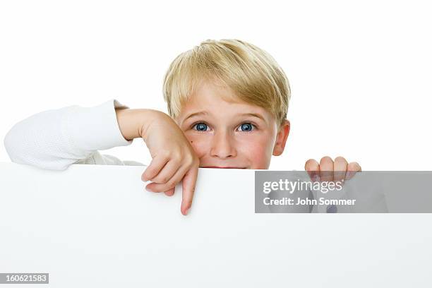 boy pointing to copy space - boy holding picture cut out stockfoto's en -beelden