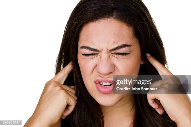 woman not listening - fingers in ears 個照片及圖片檔