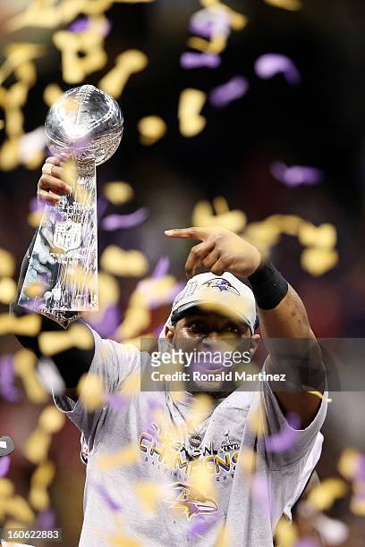 Ray Lewis of the Baltimore Ravens celebrates with the VInce Lombardi trophy after the Ravens won 34-31 against the San Francisco 49ers during Super...