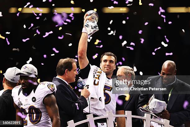 Super Bowl MVP Joe Flacco of the Baltimore Ravens celebrates with the Vince Lombardi trophy after the Ravens won 34-31 against the San Francisco...