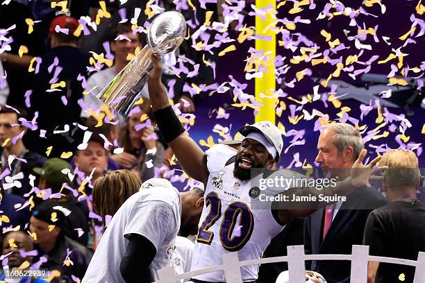 Ed Reed of the Baltimore Ravens holds up the Vince Lombardi Trophy following their 34-31 win against the San Francisco 49ers during Super Bowl XLVII...
