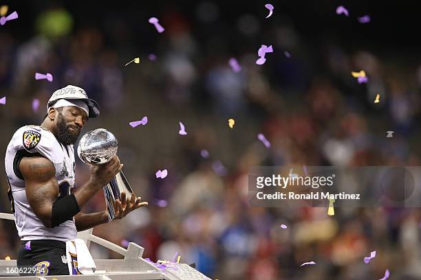 Ed Reed of the Baltimore Ravens celebrates with the Vince Lombardi trophy after the Ravens won 34-31 against the San Francisco 49ers during Super...