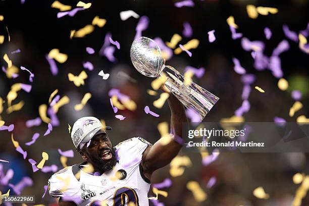 Ed Reed of the Baltimore Ravens celebrates with the Vince Lombardi trophy after the Ravens won 34-31 against the San Francisco 49ers during Super...