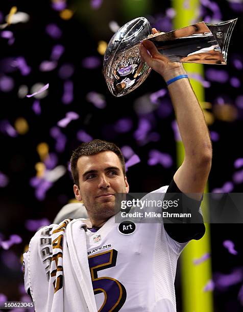 Joe Flacco of the Baltimore Ravens holds up the Vince Lombardi Trophy following their 34-31 win against the Baltimore Ravens during Super Bowl XLVII...