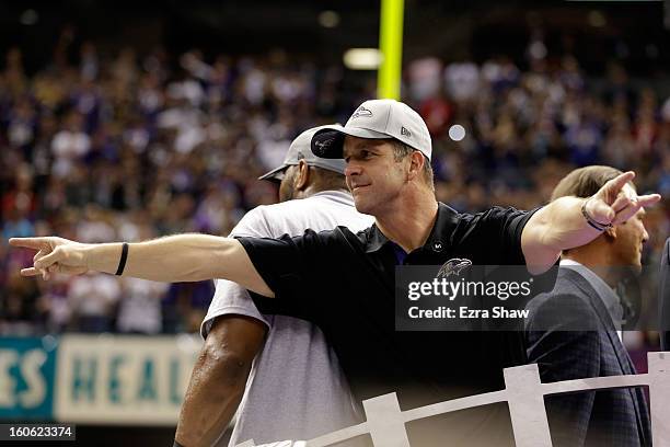 Head coach John Harbaugh of the Baltimore Ravens gestures after defeating the San Francisco 49ers during Super Bowl XLVII at the Mercedes-Benz...