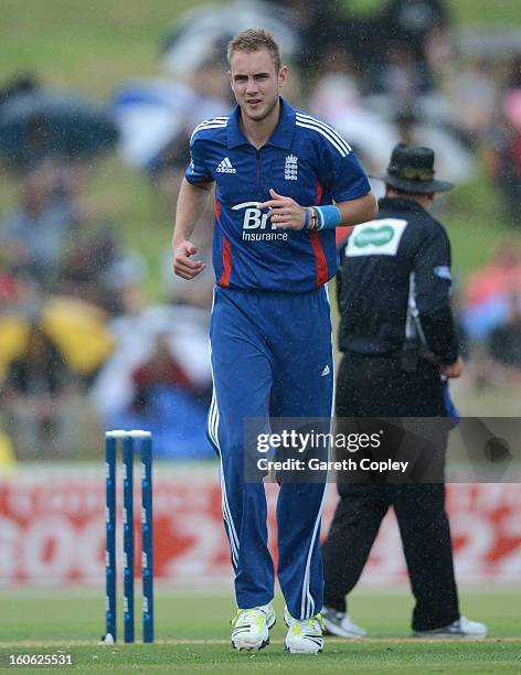 England captain Stuart Broad leaves the field as rain stops play during a T20 Practice Match between New Zealand XI and England at Cobham Oval on...