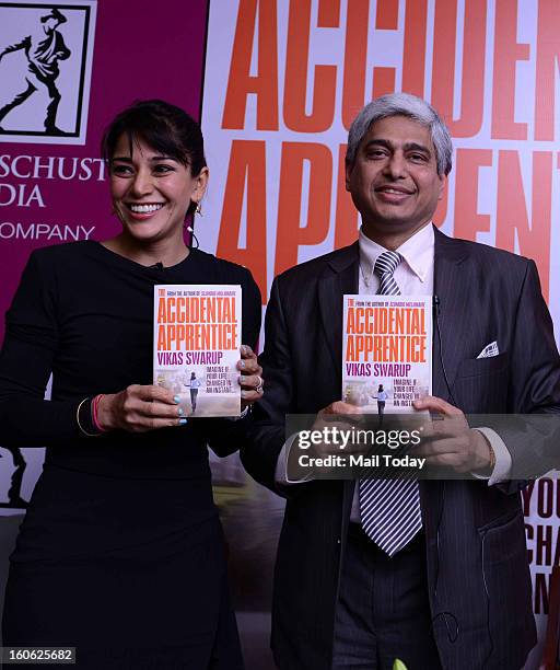 Koel Purie with Vikas Swarup at his book "Accidental Apprentice" release function in New Delhi on Friday.