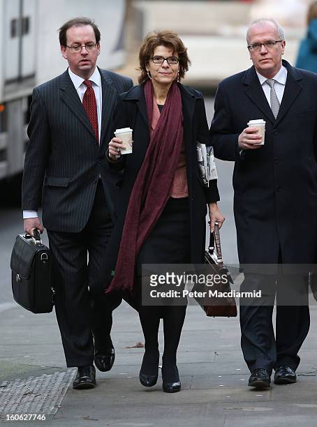 Vicky Pryce arrives at Southwark Crown Court with her legal team on February 4, 2013 in London, England. Former Cabinet member Chris Huhne and his...