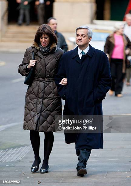 Former Cabinet Minister Chris Huhne arrives at Southwark Crown Court with Carina Trimingham on February 4, 2013 in London, England. Former Cabinet...