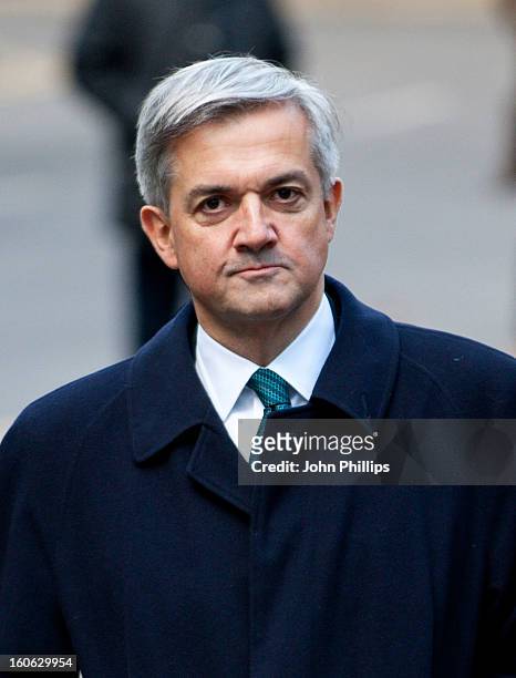 Former Cabinet Minister Chris Huhne arrives at Southwark Crown Court on February 4, 2013 in London, England. Former Cabinet member Chris Huhne and...