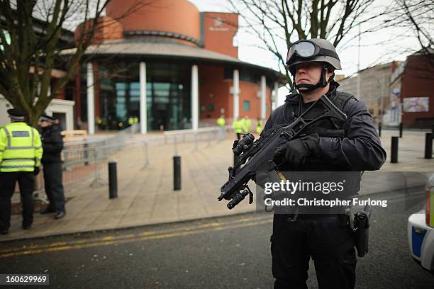 Armed police stand guard as the trial of Dale Cregan, who faces charges of murder and attempted murder, starts at Preston Crown Court on February 4,...