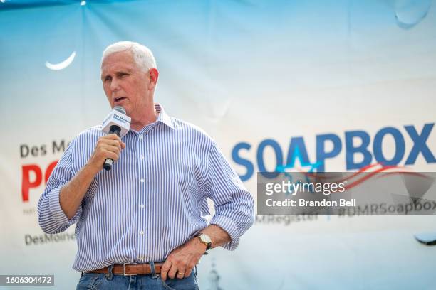 Republican presidential candidate former Vice President Mike Pence speaks during a campaign rally on the Des Moines Register SoapBox stage at the...