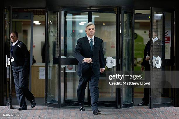 Former Cabinet Minister Chris Huhne leaves Southwark Crown Court on February 4, 2013 in London, England. Huhne and his ex-wife Vicky Pryce are on...